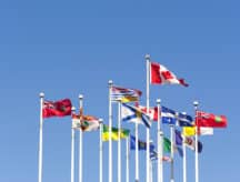 Canadian national flag alongside all the provincial flags